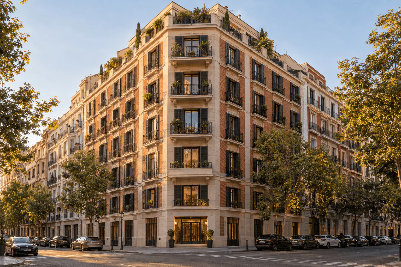 Inspiración de edificio residencial español con fachada de ladrillo y piedra